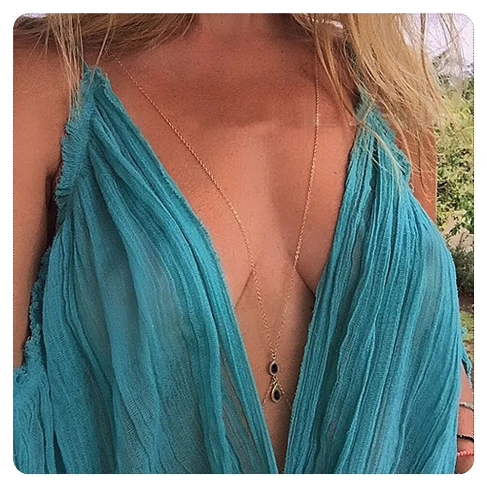 Collier de dos papillon à pierre noire en gouttes en or pour femme