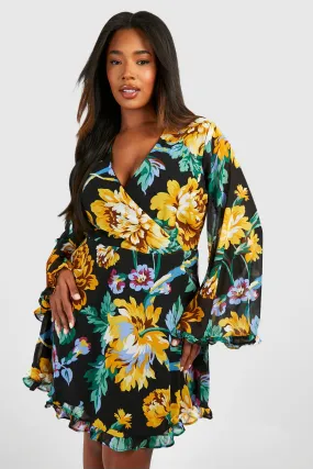 Grande taille - Robe portefeuille fleurie à pompons