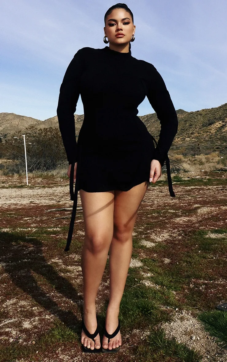 Plus Robe moulante portefeuille en maille tricot noire nouée